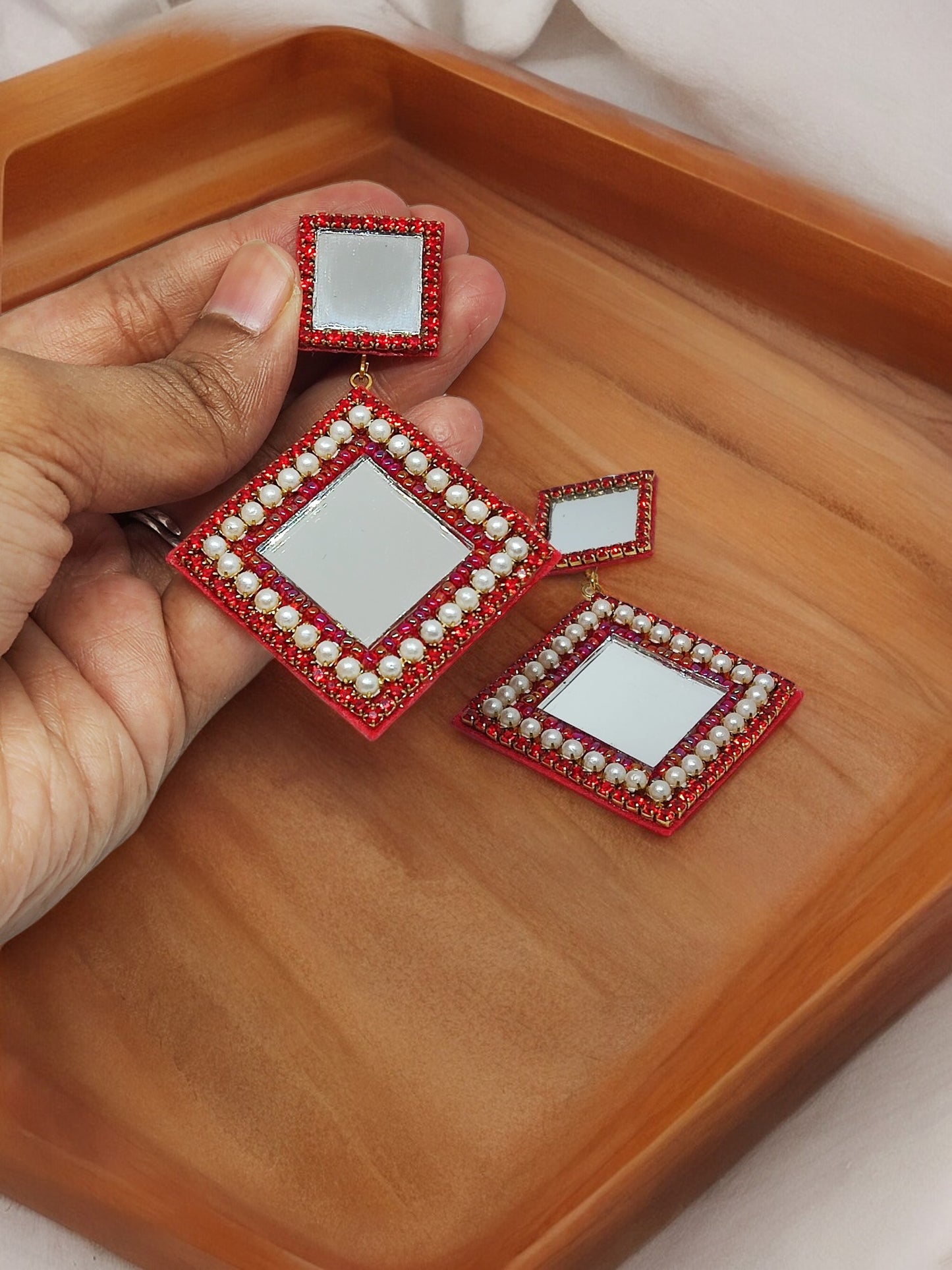 Scarlett mirror embroidery earrings from Anusangi Collections with red beaded and pearl detailing