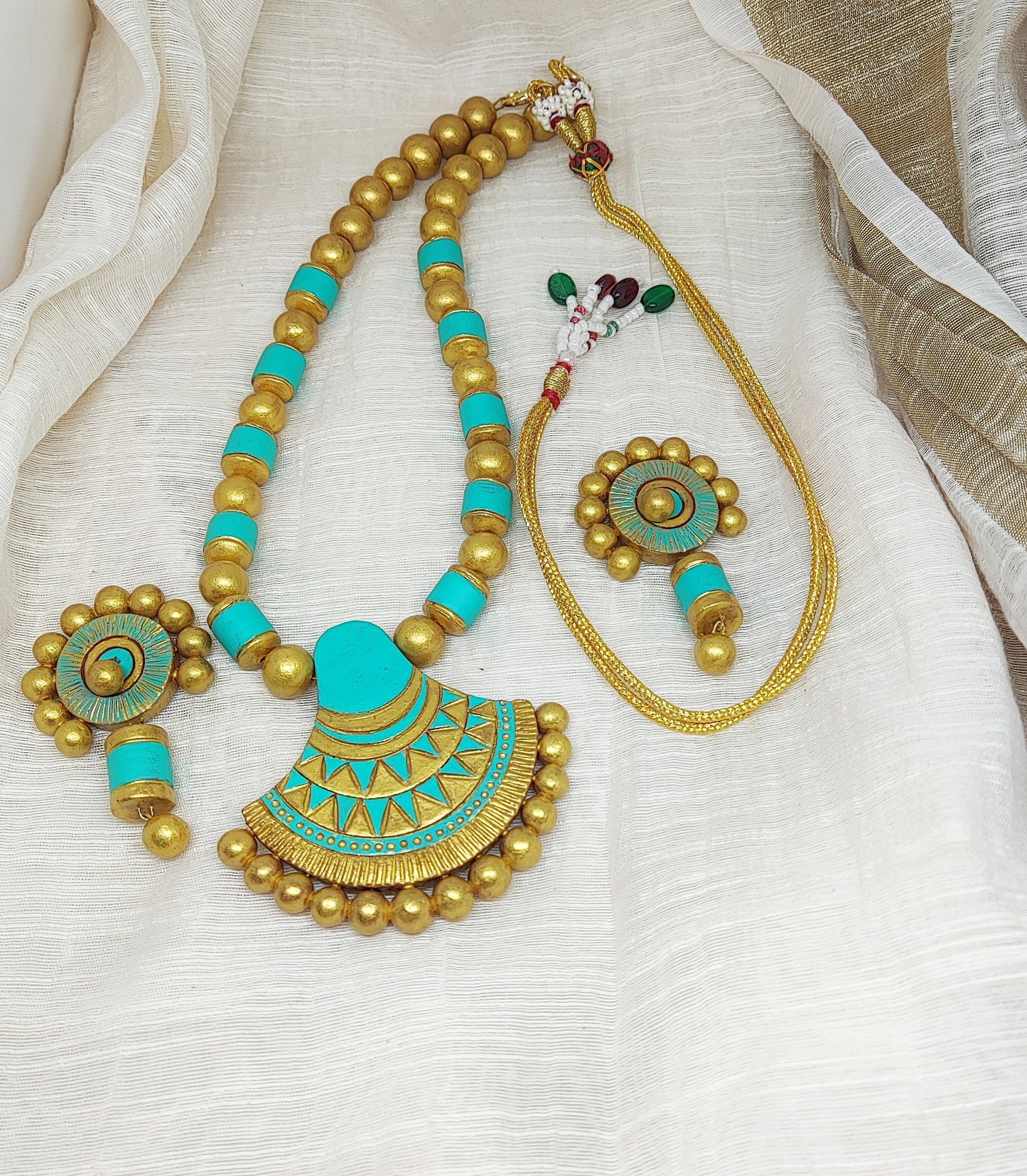 Anusangi Collections sea green terracotta jewelry set with necklace and matching earrings