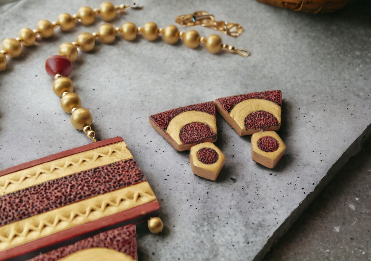Shravya Terracotta necklace and earrings set by Anusangi Collections featuring handcrafted earthy tones and intricate patterns