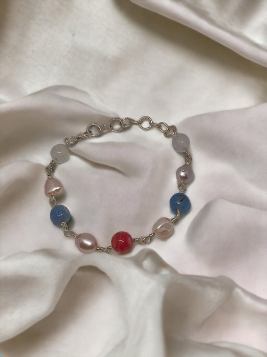 Colorful gemstone silver bracelet by Anusangi Collections with multicolored stones on sterling silver chain