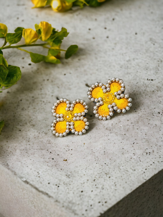Anusangi Collections summer floral statement earrings featuring yellow fabric flowers with pearl accents