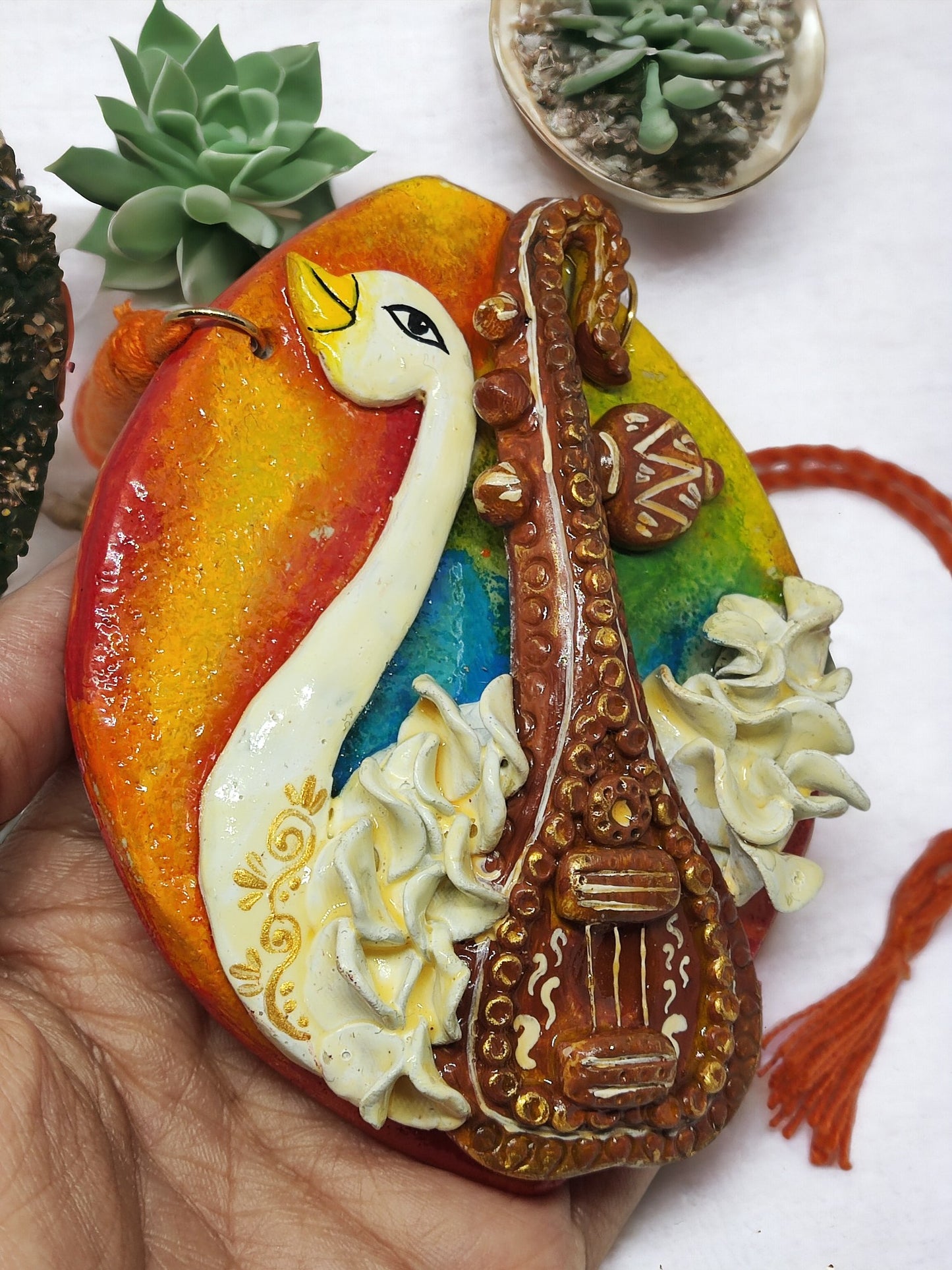 Traditional Rajhans pendant set for women by Anusangi Collections featuring colorful fabric jewelry with swan and musical instrument design