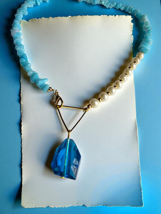 Anusangi Collections uncut beads pearl jewelry set featuring blue stone and elegant design