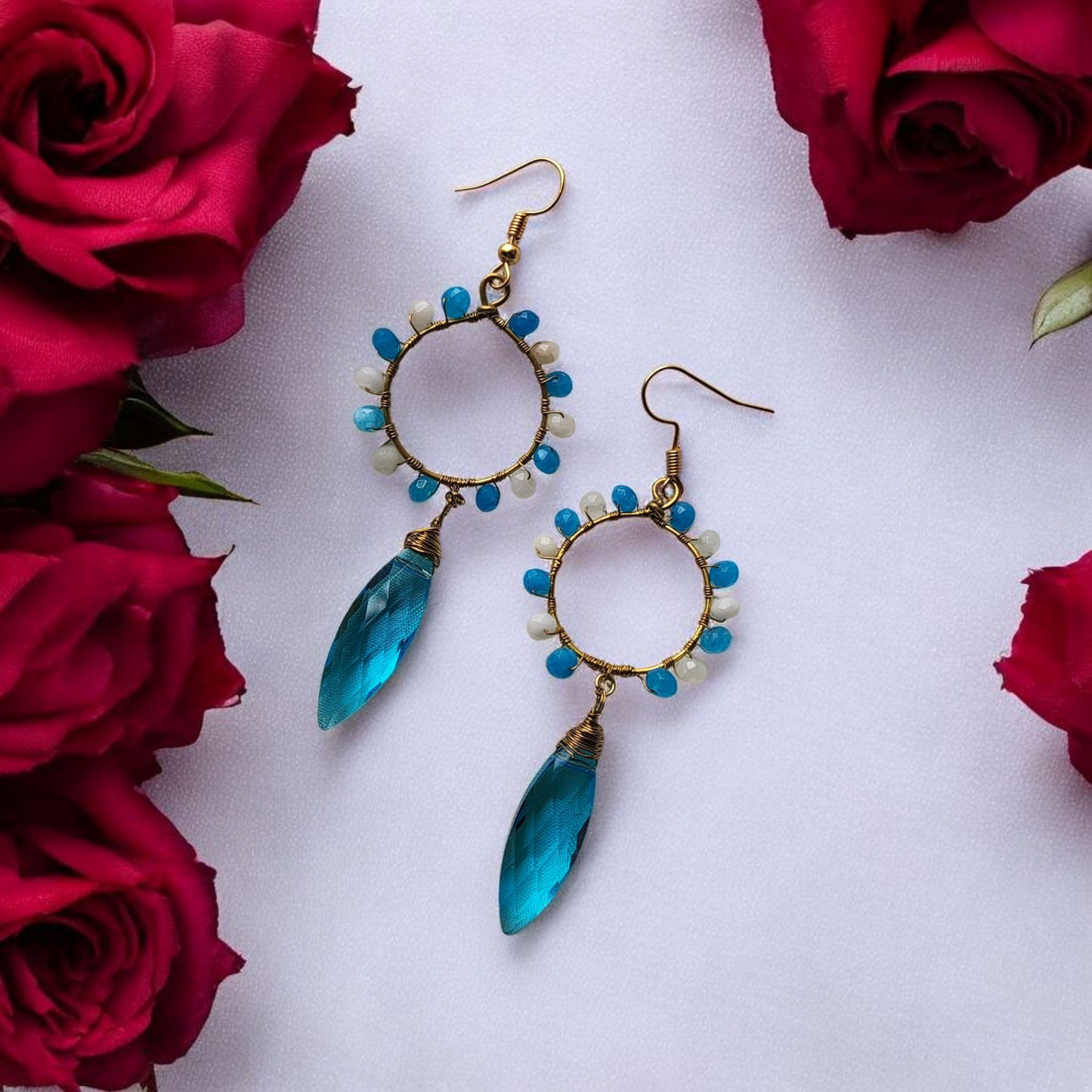 Anusangi Collections unique crystal beaded dangles in blue and white beads with gold hoops and teal crystal drops