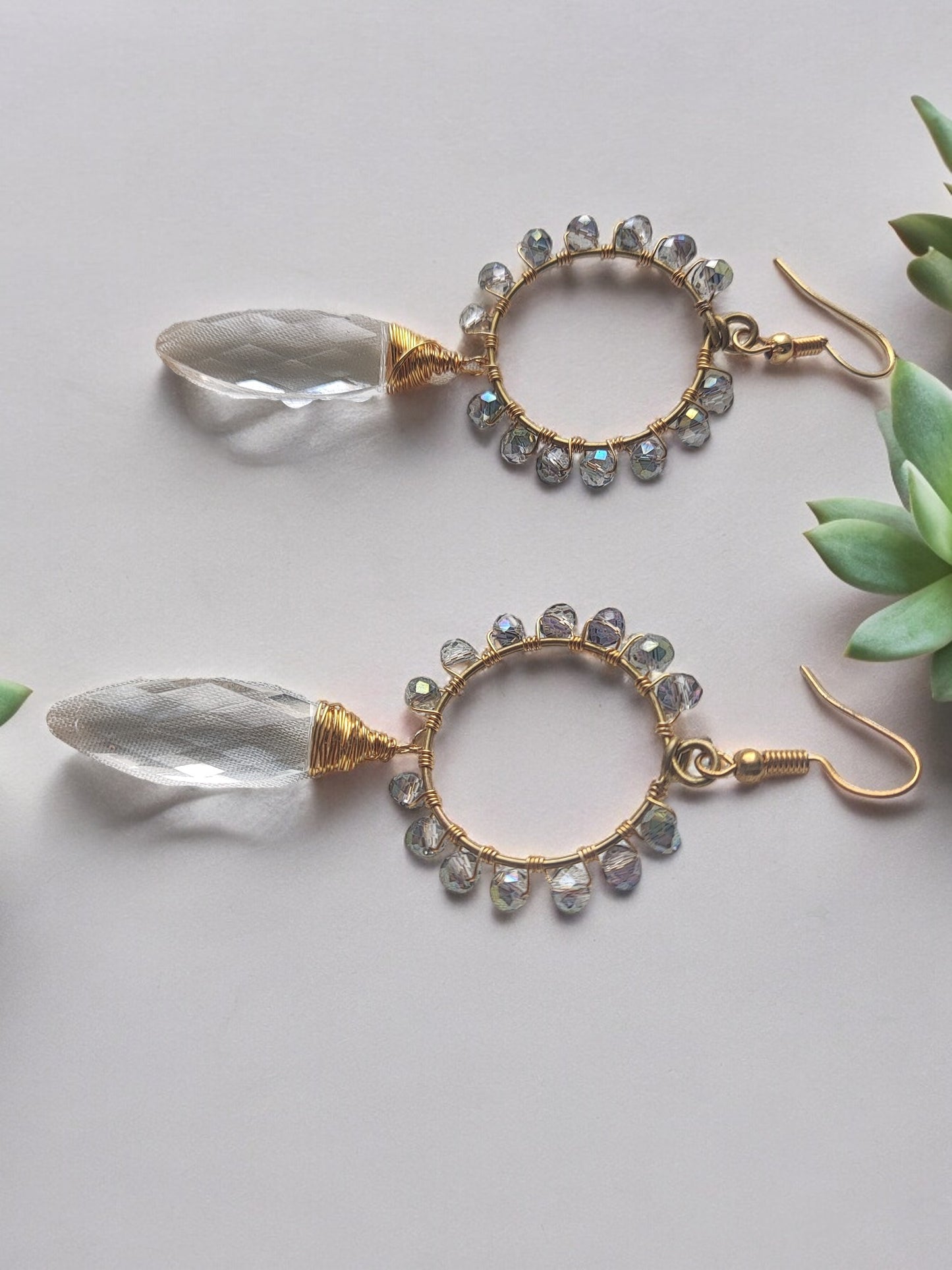 Unique crystal beaded dangles earrings with gold hoops and clear teardrop crystals from Anusangi Collections