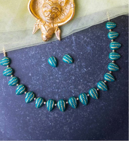 Varka terracotta jewelry set with teal and gold painted beads necklace and matching earrings