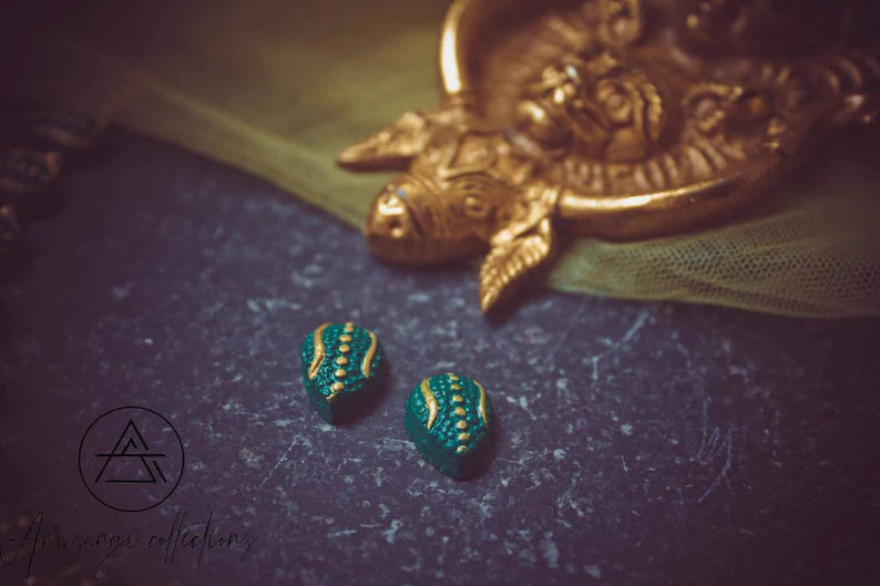 Varka terracotta jewelry set featuring green and gold handcrafted earrings from Anusangi Collections