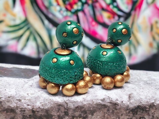 Green and gold jhumka style Vasundhara terracotta earrings with textured finish from Anusangi Collections