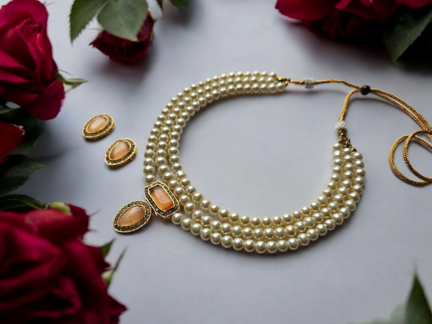 Traditional Indian choker for wedding with pearl beads and matching earrings from Anusangi Collections
