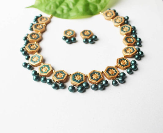 Viridescent Green Glory Necklace terracotta jewelry set by Anusangi Collections with green beads and hexagonal pendants