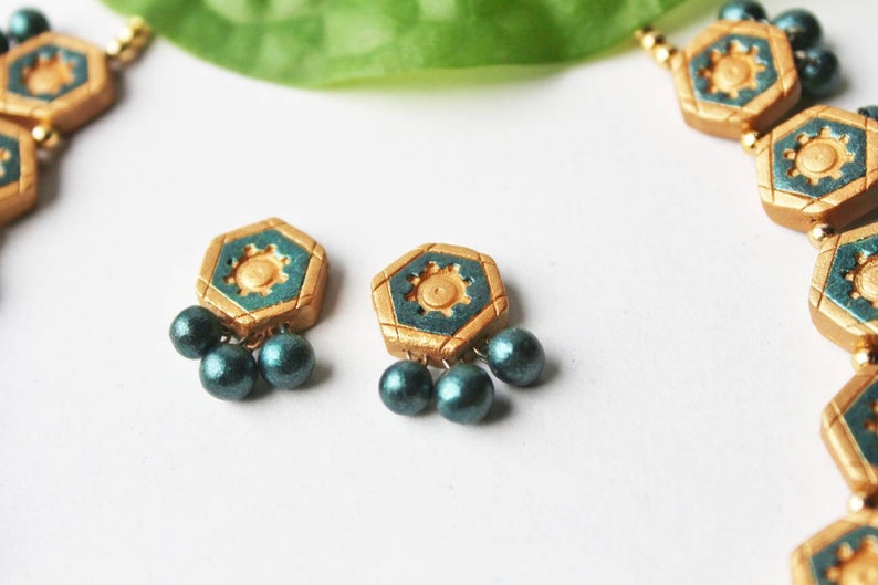 Viridescent Green Glory Necklace terracotta jewelry set featuring hexagonal gold and green beads with matching earrings from Anusangi Collections