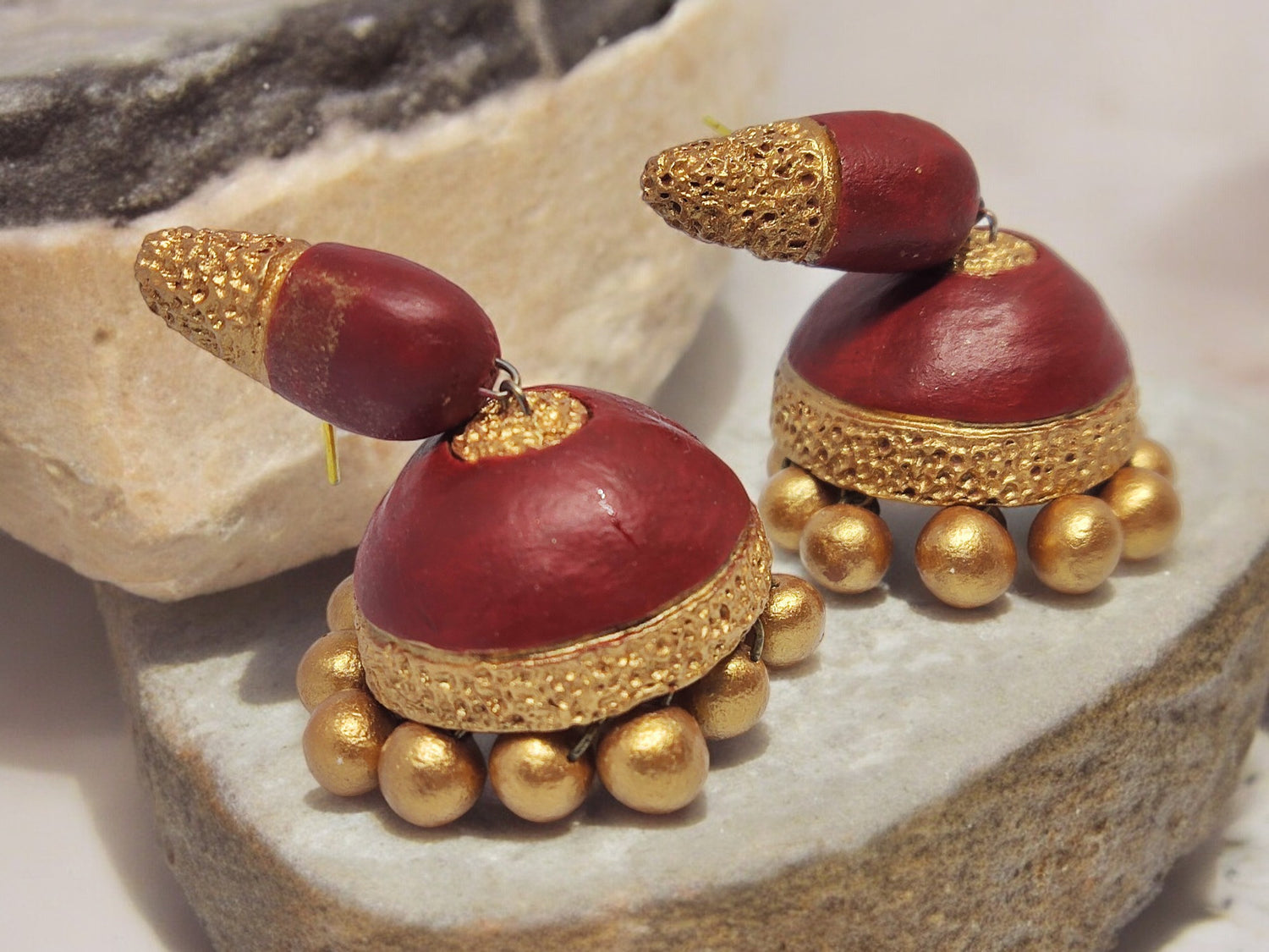 Handmade terracotta earrings online featuring traditional red and gold jhumka design with intricate detailing