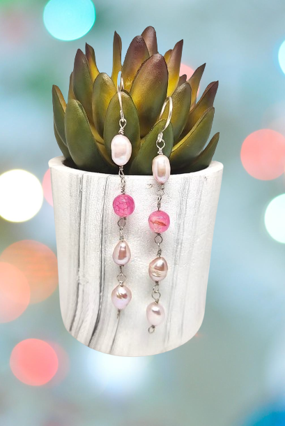 The earrings feature a striking composition of 3 pearls and 1 color of semi-precious Agate beads, creating a stand-out look that will capture attention in any crowd.