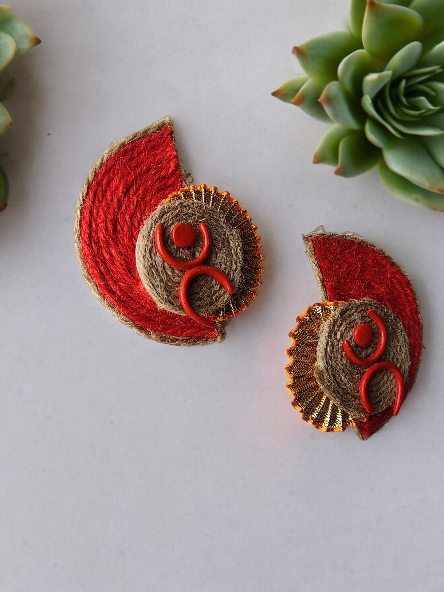 <p data-mce-fragment="1">Introducing Aanshi Fabric Earrings, the perfect blend of simplicity and style. Handmade with delicate jute thread and mouldit clay, these earrings offer a light weight feel and a sophisticated look. Elevate any outfit with these stylish and exclusive earrings.</p>