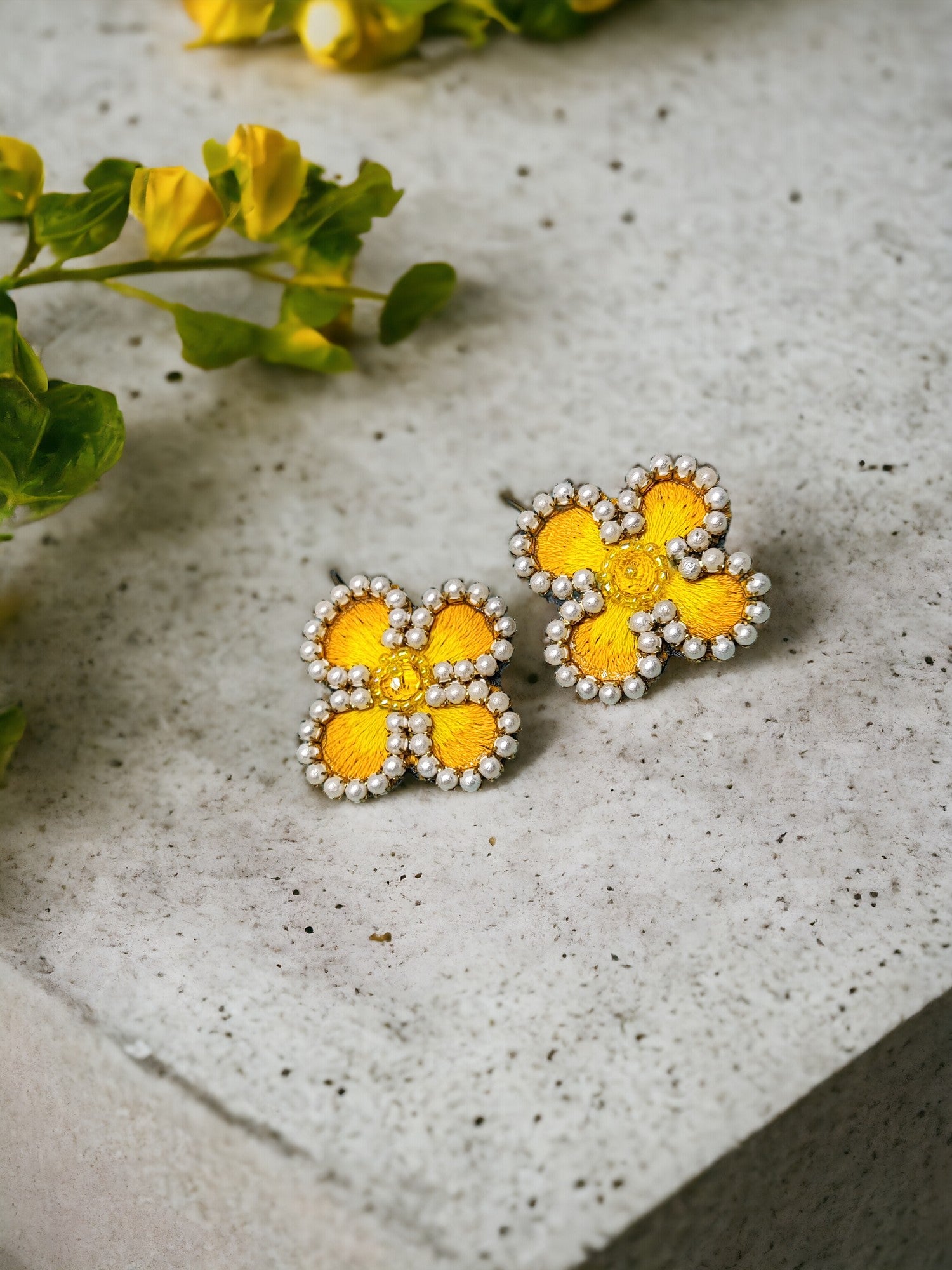 Exquisitely crafted with hand-stitched flower pattern fabric, our Summer embroidery Earrings are a true work of art. Each earring is carefully handmade, making them unique and exclusive. Elevate your style with these luxurious earrings, perfect for any summer occasion.