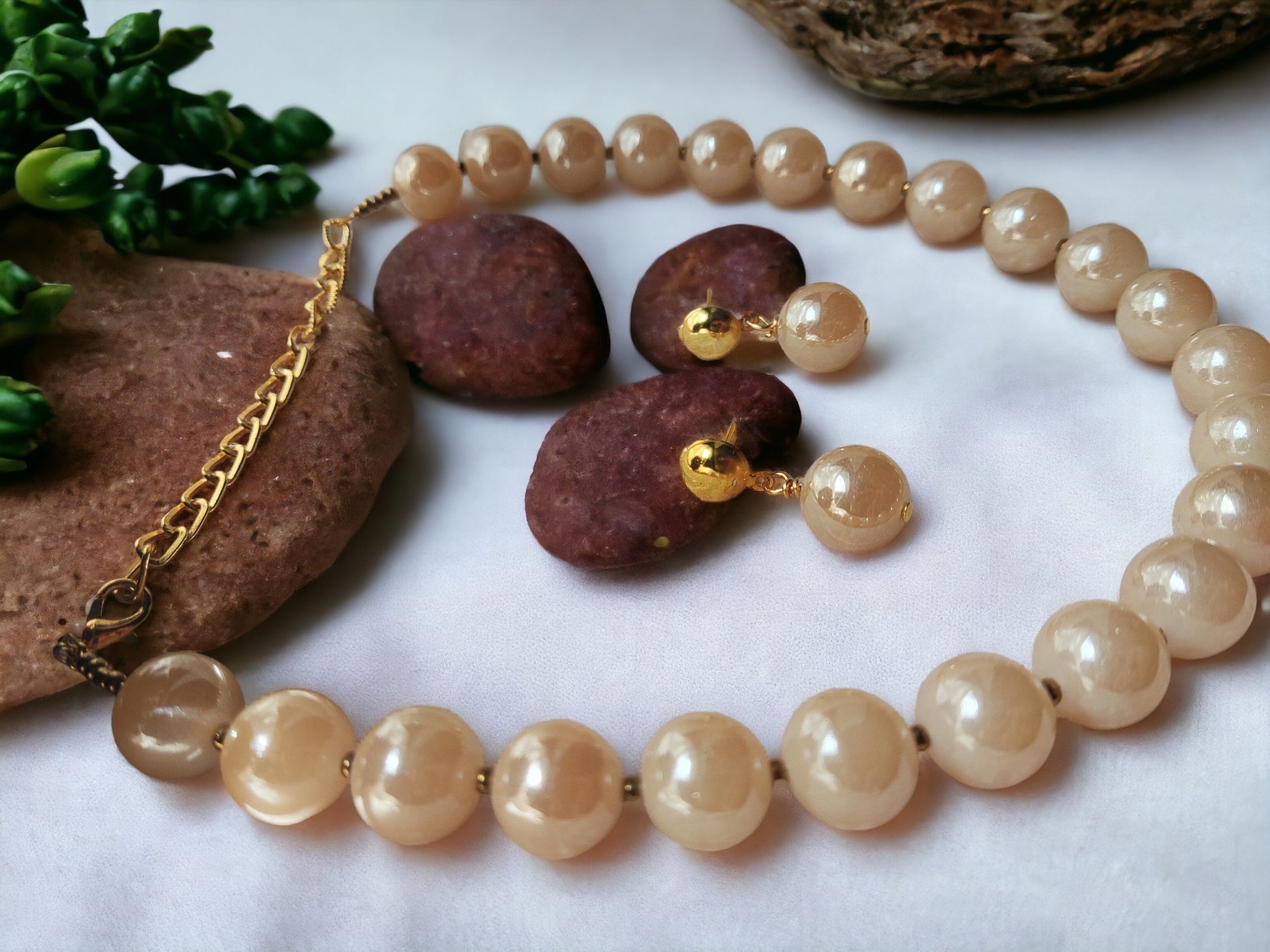 Indulge in luxury with our Glass Pearl Jewellery Set. Dazzling big size beads exude sophistication and elevate any outfit. Handcrafted with precision and premium materials, this set is perfect for both special occasions and daily wear. Upgrade your jewellery collection and make a statement today.