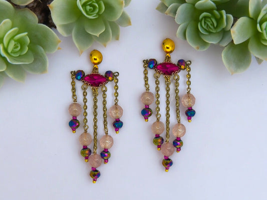 <p data-mce-fragment="1">Indulge in luxury with our Xiti Beaded Earrings. Handcrafted with intricate beadwork in a stunning pink and gold combination, these long earrings add a touch of sophistication to any outfit. Elevate your style and make a statement with these exclusive and elegant accessories.</p>