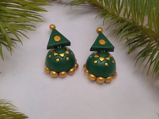 Transform your look with our exquisite Green And Gold Terracotta Earring. Crafted from premium materials, these earrings add a touch of luxury and elegance to any outfit. The intricate design and vibrant colors make them a perfect accessory for any occasion. Elevate your style and make a statement with these stunning earrings.