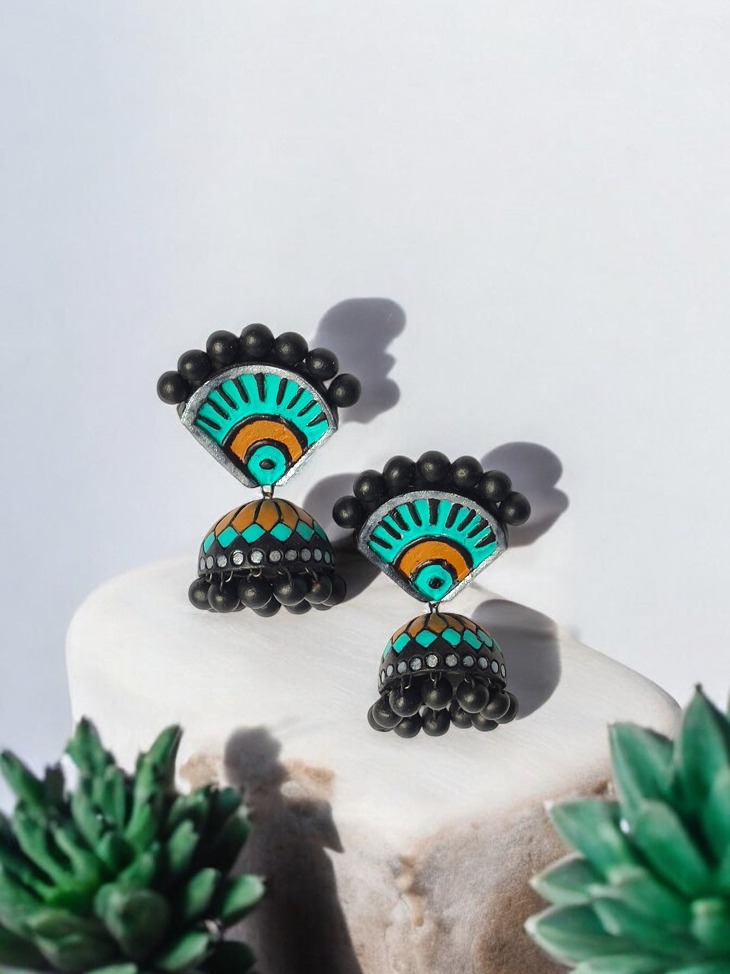 Anusangi Collections Aachal ethnic terracotta jhumka earrings with black and turquoise detailing