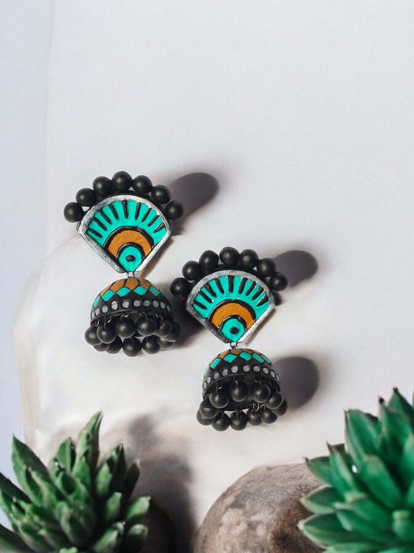 Aachal ethnic terracotta jhumka earrings by Anusangi Collections in black and turquoise design