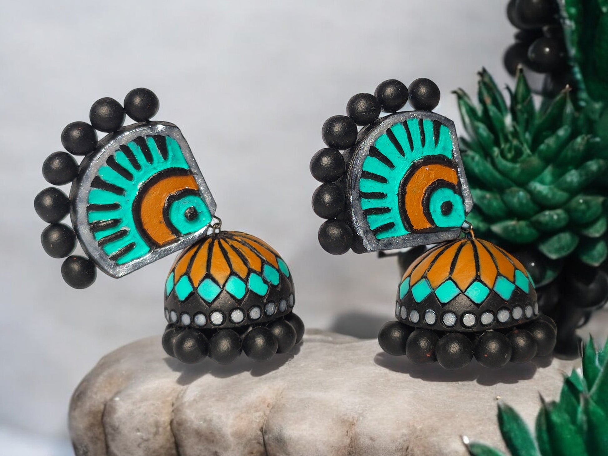 Aachal ethnic terracotta jhumka earrings from Anusangi Collections with colorful hand-painted tribal design