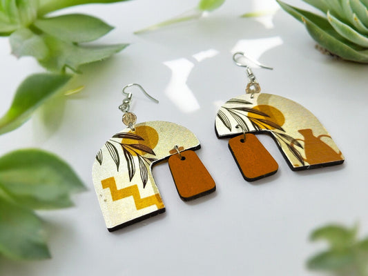 Anusangi Collections boho dangle earrings for women with abstract brown and gold beaded design
