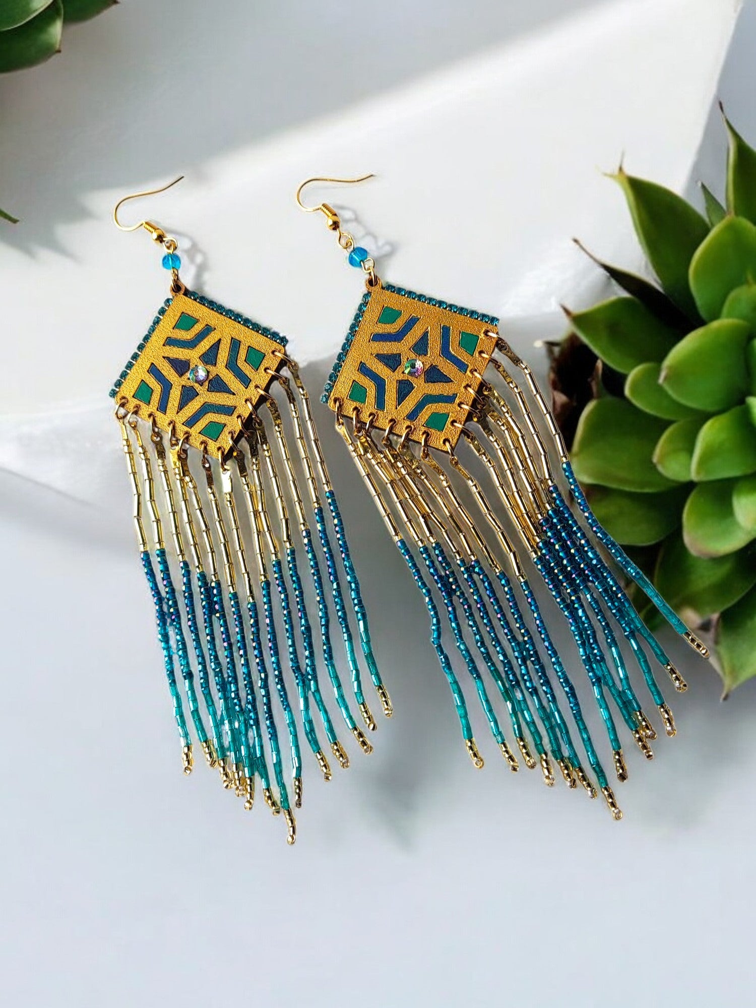 Anusangi Collections boho statement beaded earrings with gold and turquoise beads and fringe design