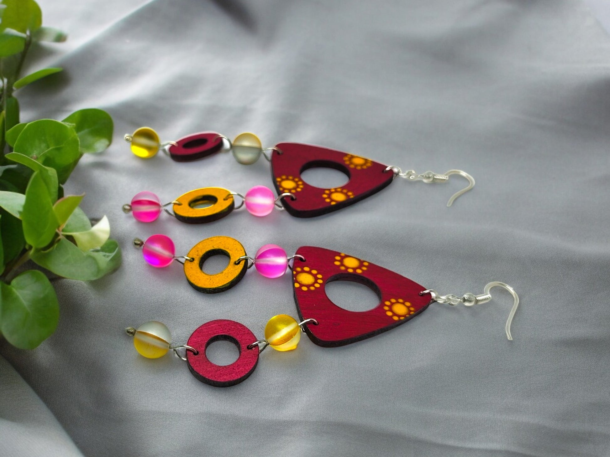 Colorful terracotta earrings for women with round and triangular beads in red, yellow, and pink from Anusangi Collections