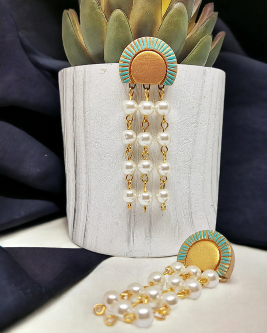 Dangling darreth terracotta jewelry earrings with pearl beads and turquoise gold accents from Anusangi Collections
