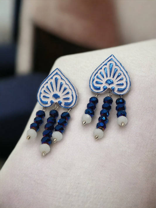 Fancy terracotta earrings for women from Anusangi Collections with blue and white beaded design