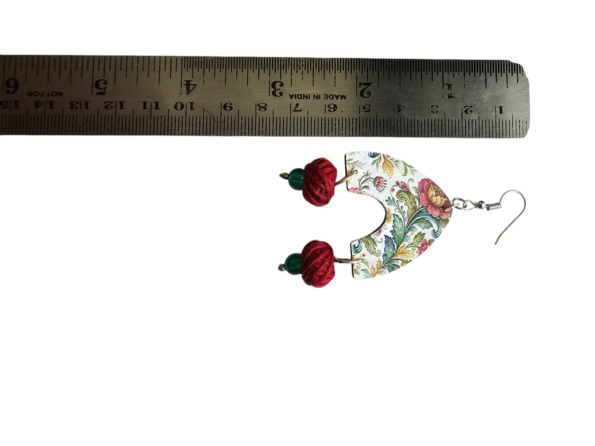 Floral statement earrings handmade with colorful floral patterns and vibrant red beads