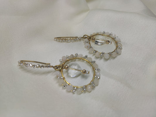 Anusangi Collections beaded white wire wrap earrings with gold-tone hoops and clear beads