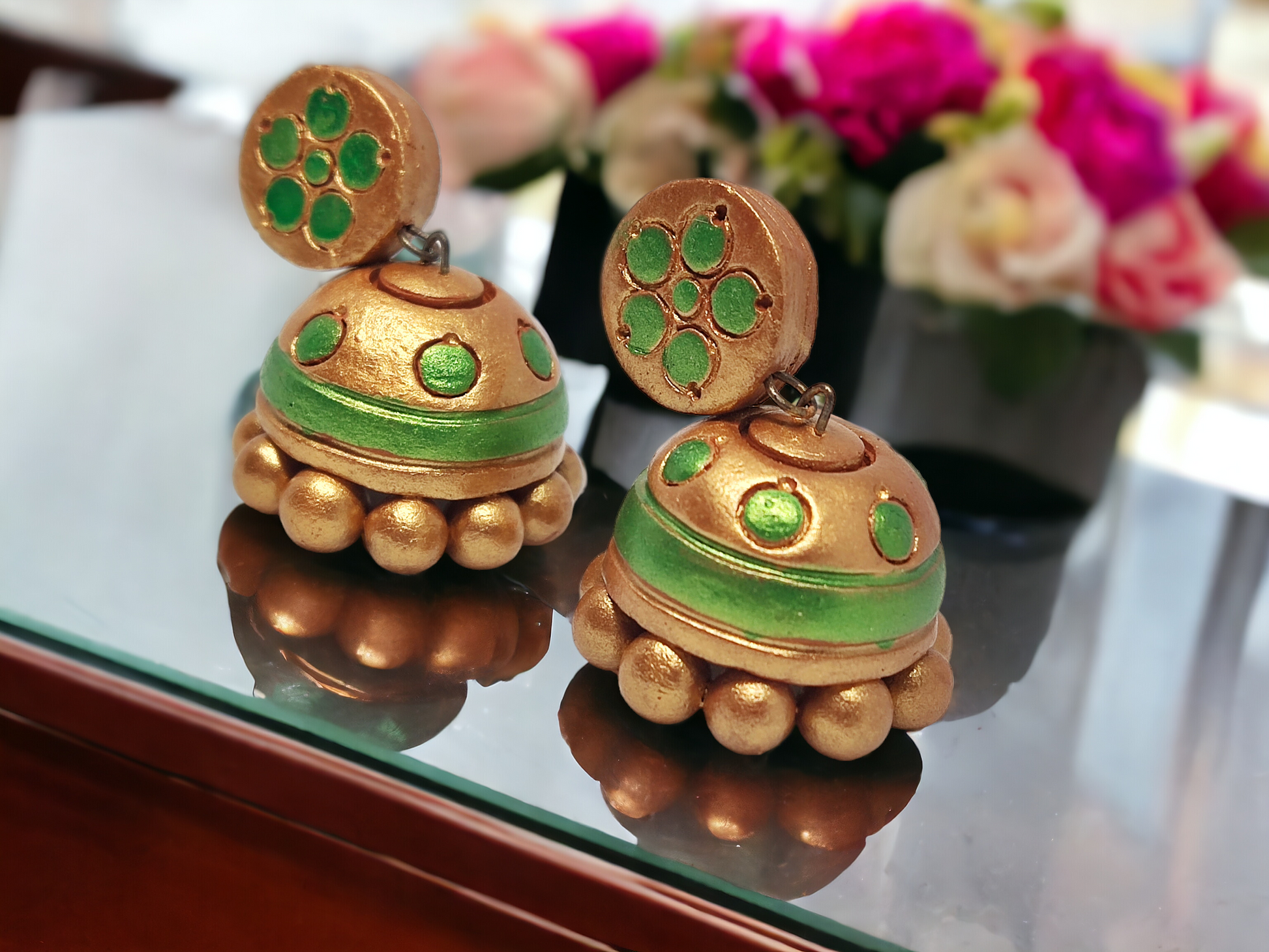 Green and gold jhumka online terracotta earrings from Anusangi Collections with intricate design