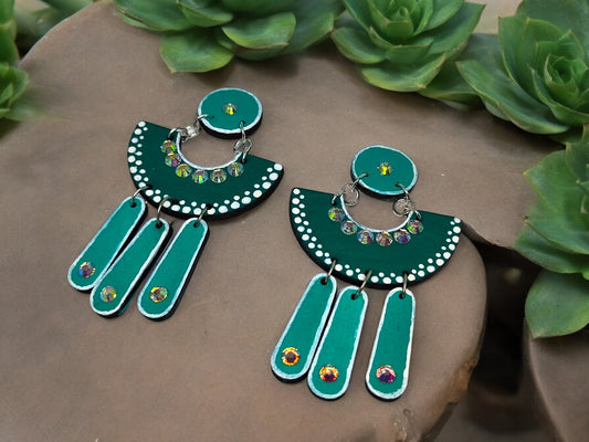 Green terracotta earrings by Anusangi Collections featuring beaded design with hanging elements