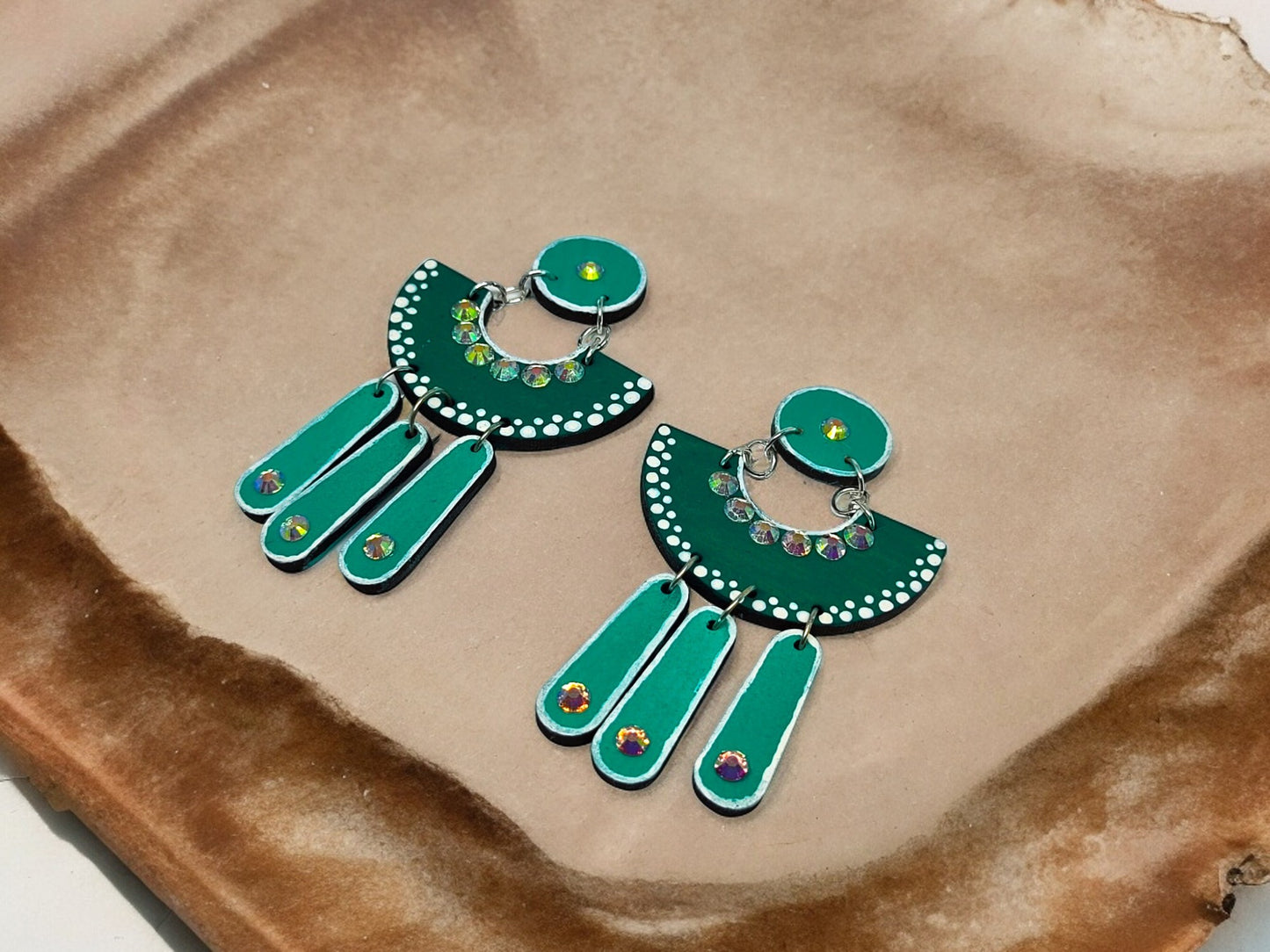 Green terracotta earrings with intricate beadwork and floral design from Anusangi Collections