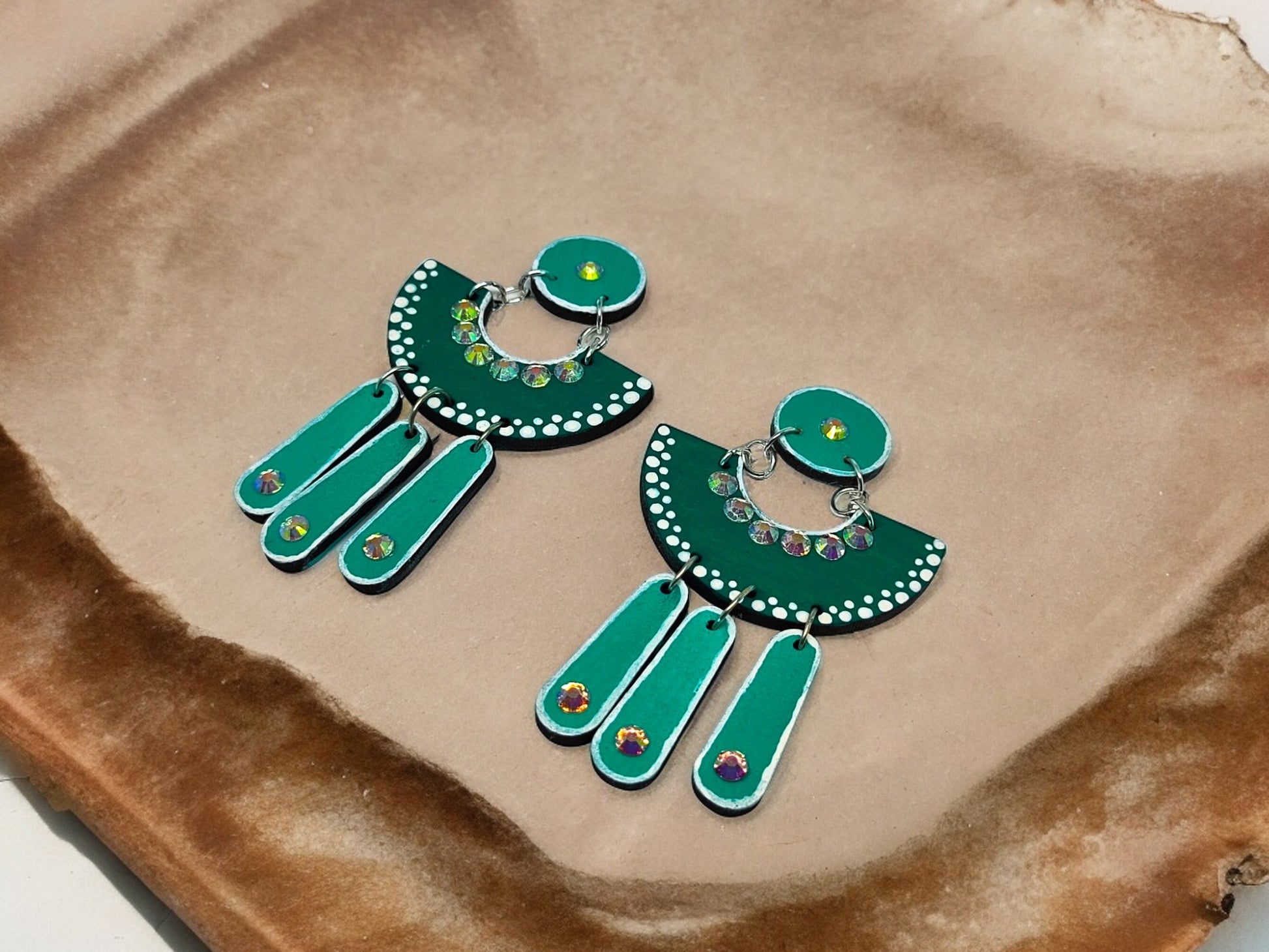 Green terracotta earrings with intricate beadwork and floral design from Anusangi Collections