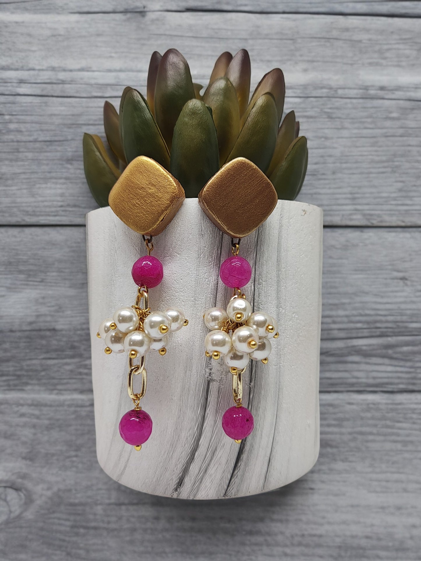 Ishana terracotta earrings with gold square studs, pink beads, and white pearl clusters