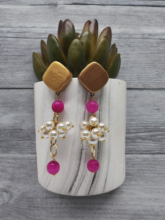 Ishana terracotta earrings with gold square studs, pink beads, and white pearl clusters