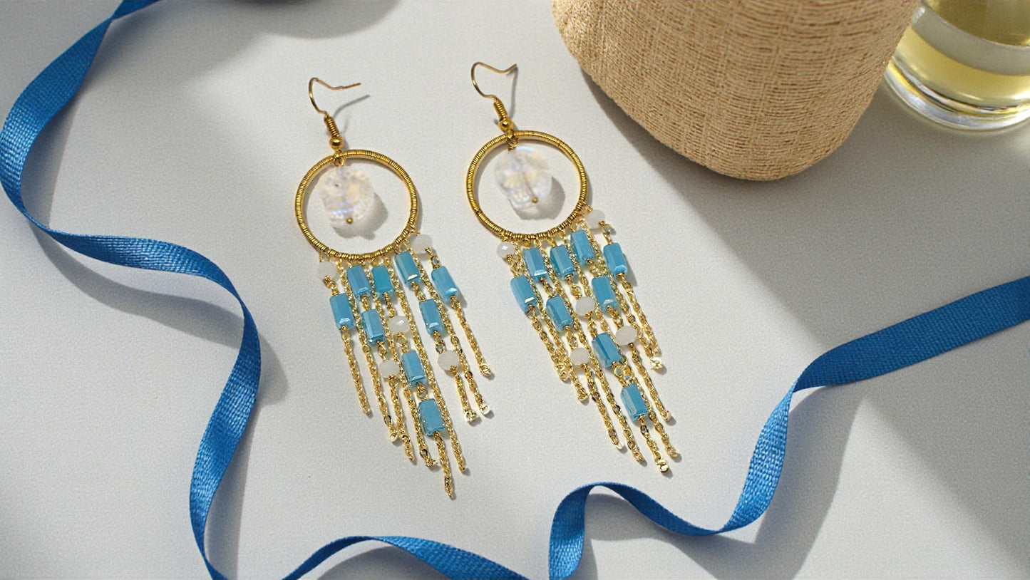 Anusangi Collections Jalpari Cascade Hoops beaded earrings in gold with blue and white beads on a white surface
