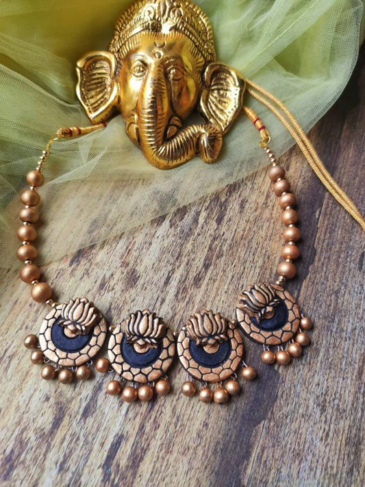 Lotus Malhar Terracotta Necklace from Anusangi Collections featuring handcrafted floral designs with earthy tones