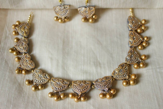 Terracotta Jewelry set by Anusangi Collections featuring a lustrous necklace for special occasions with matching earrings