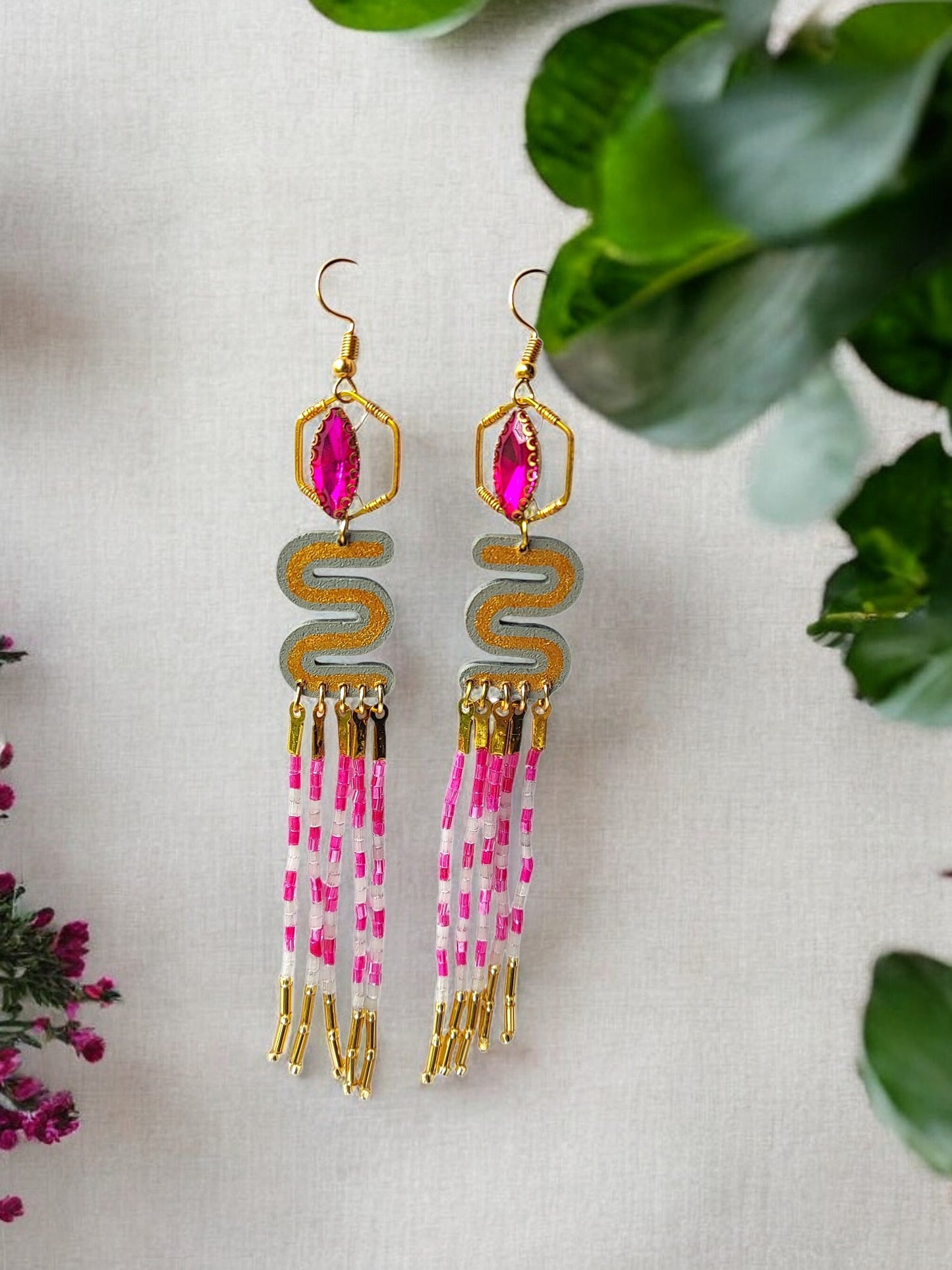 Anusangi Collections pink and gold dangle earrings featuring vibrant beaded design and stylish fringe