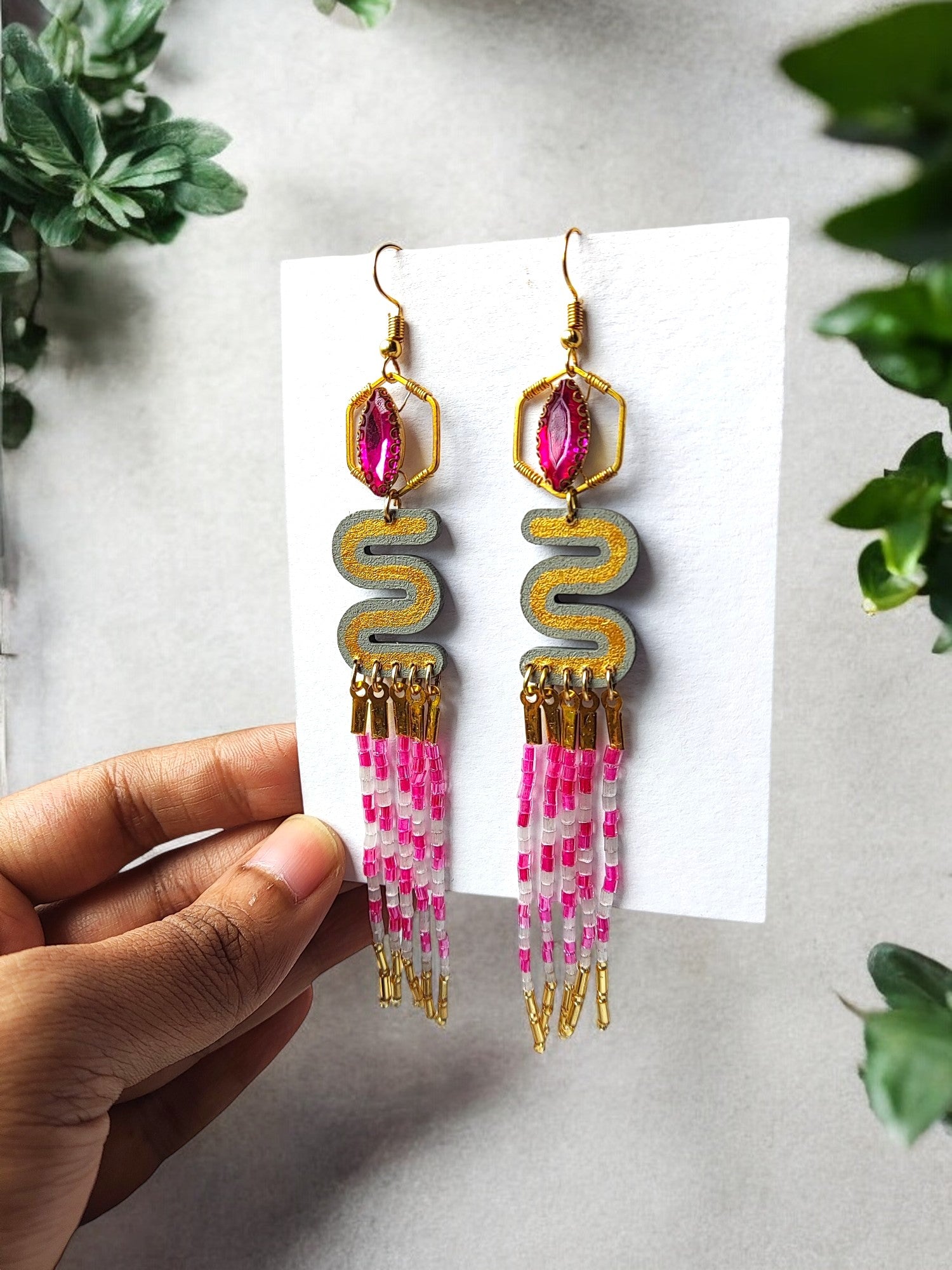 Pink and gold dangle earrings from Anusangi Collections with intricate beaded design