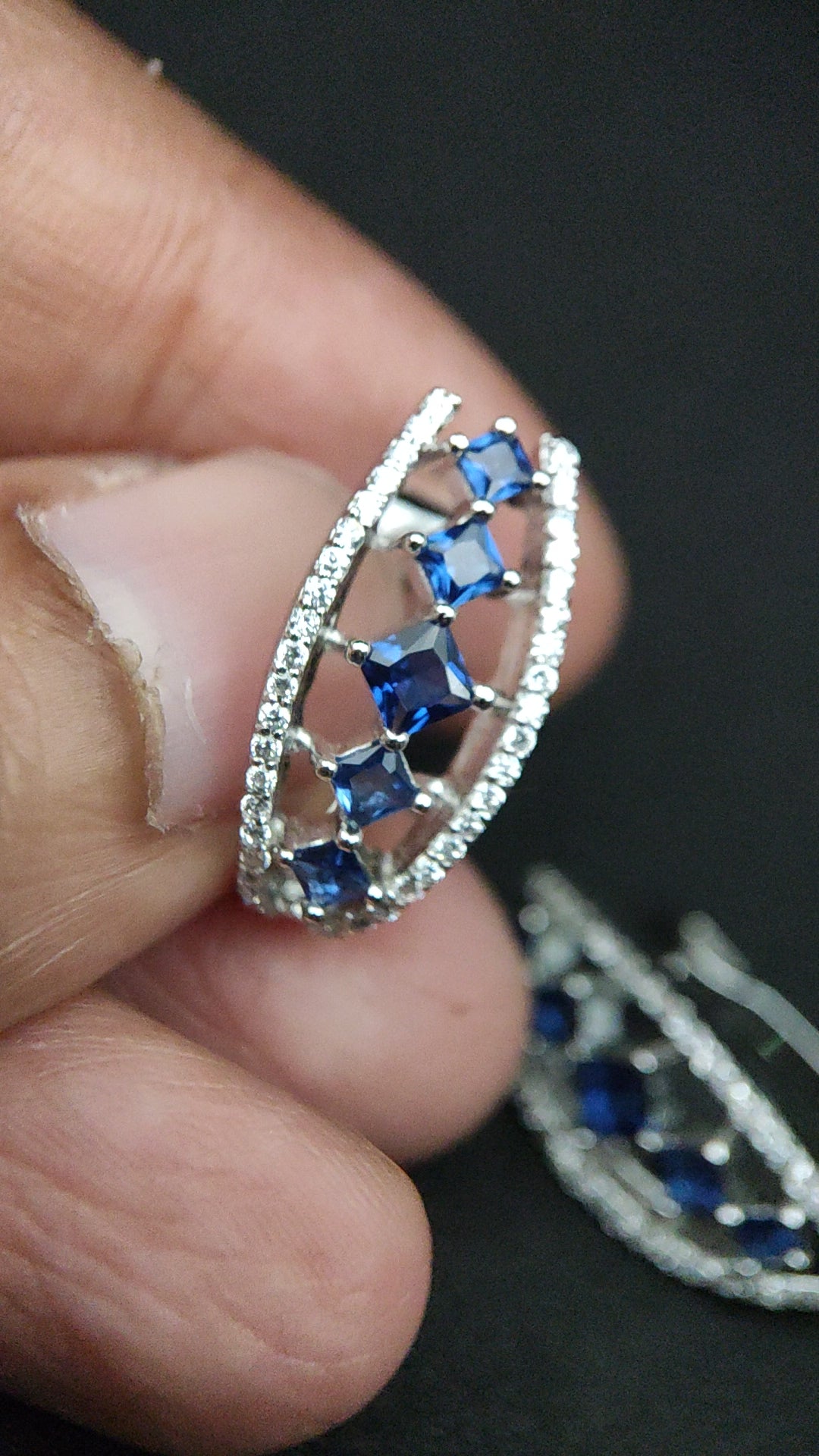 Bishakha Sterling silver earrings. made of silver, High Quaility AD Diamonds and princess cut stone Blue in color