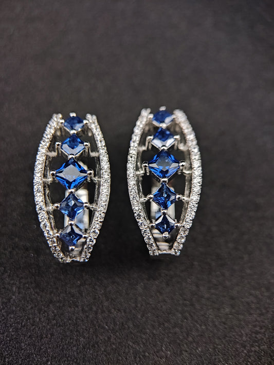 Bishakha Sterling silver earrings. made of silver, High Quaility AD Diamonds and princess cut stone Blue in color