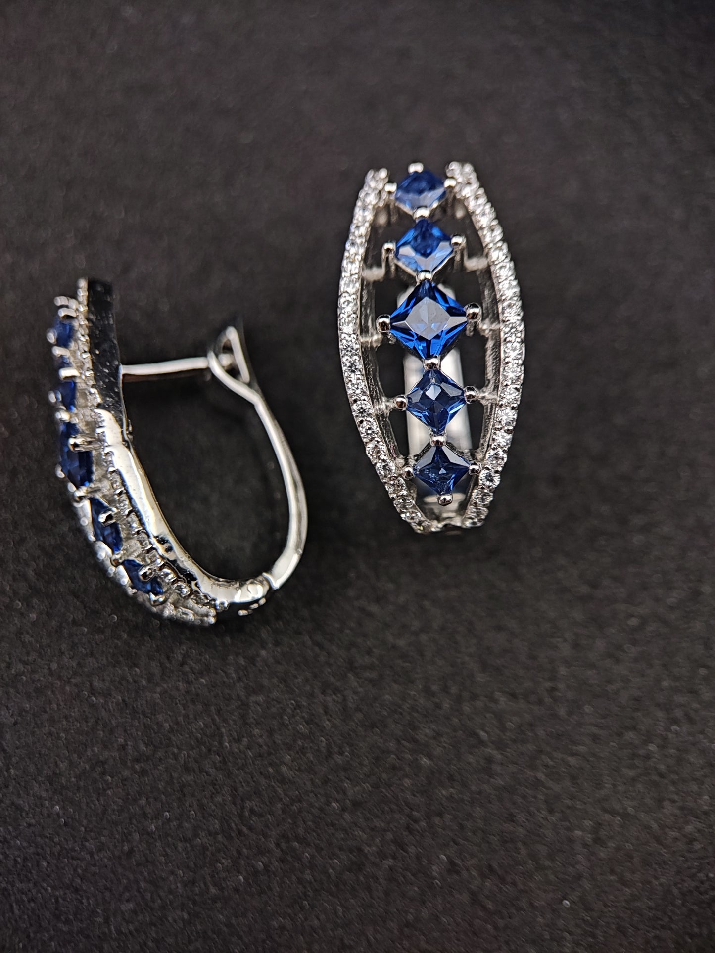Bishakha Sterling silver earrings. made of silver, High Quaility AD Diamonds and princess cut stone Blue in color