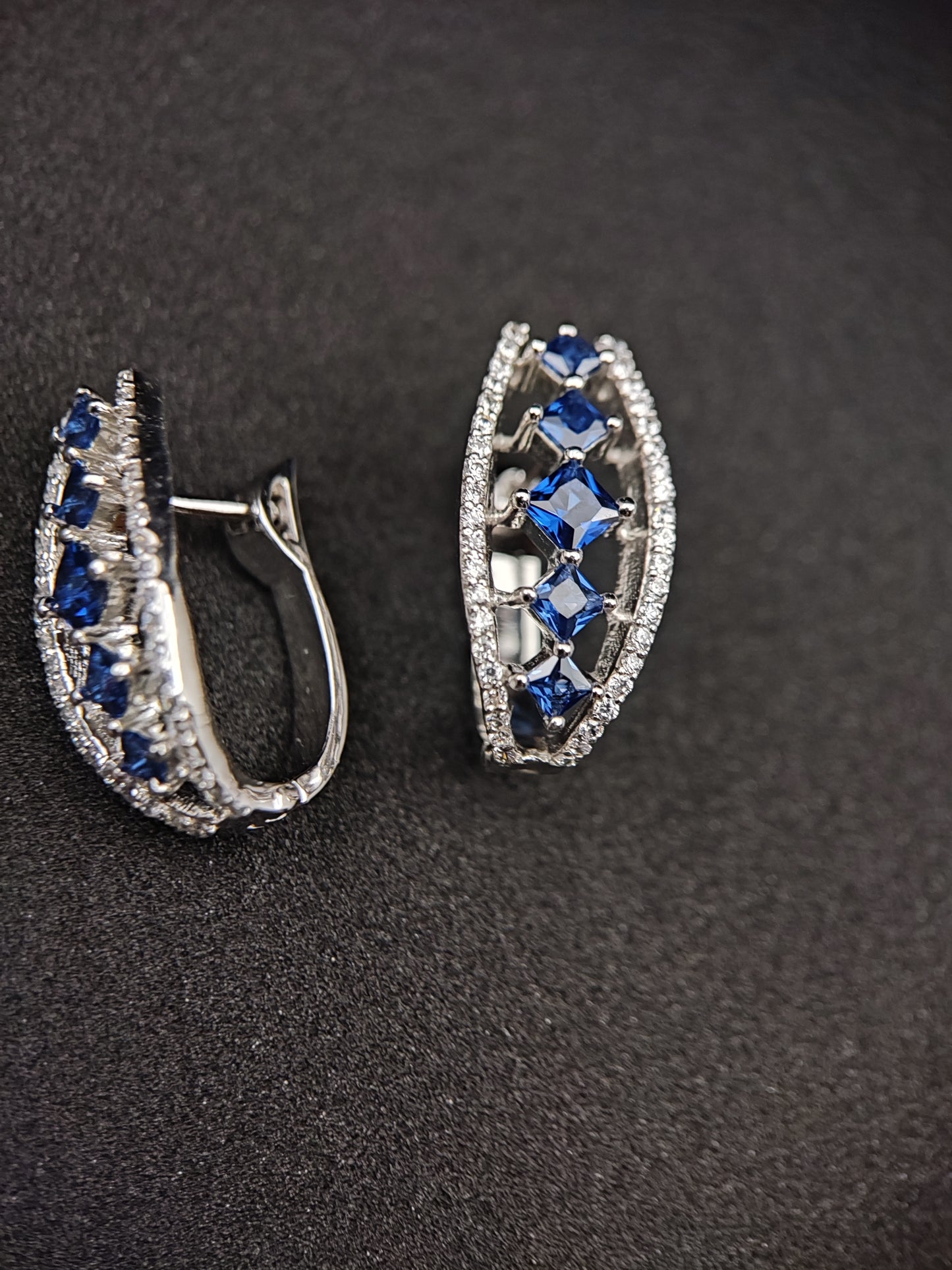 Bishakha Sterling silver earrings. made of silver, High Quaility AD Diamonds and princess cut stone Blue in color