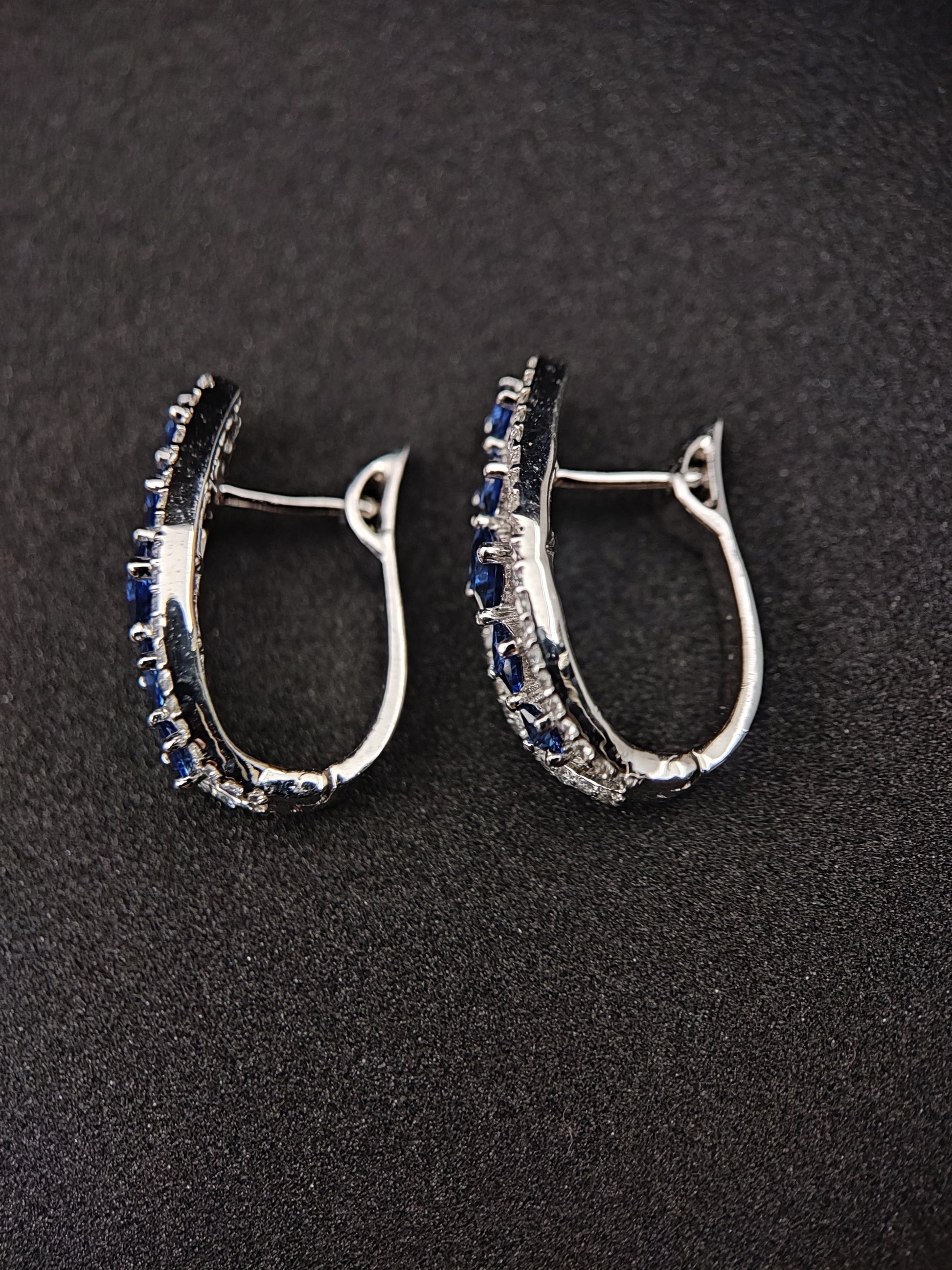 Bishakha Sterling silver earrings. made of silver, High Quaility AD Diamonds and princess cut stone Blue in color