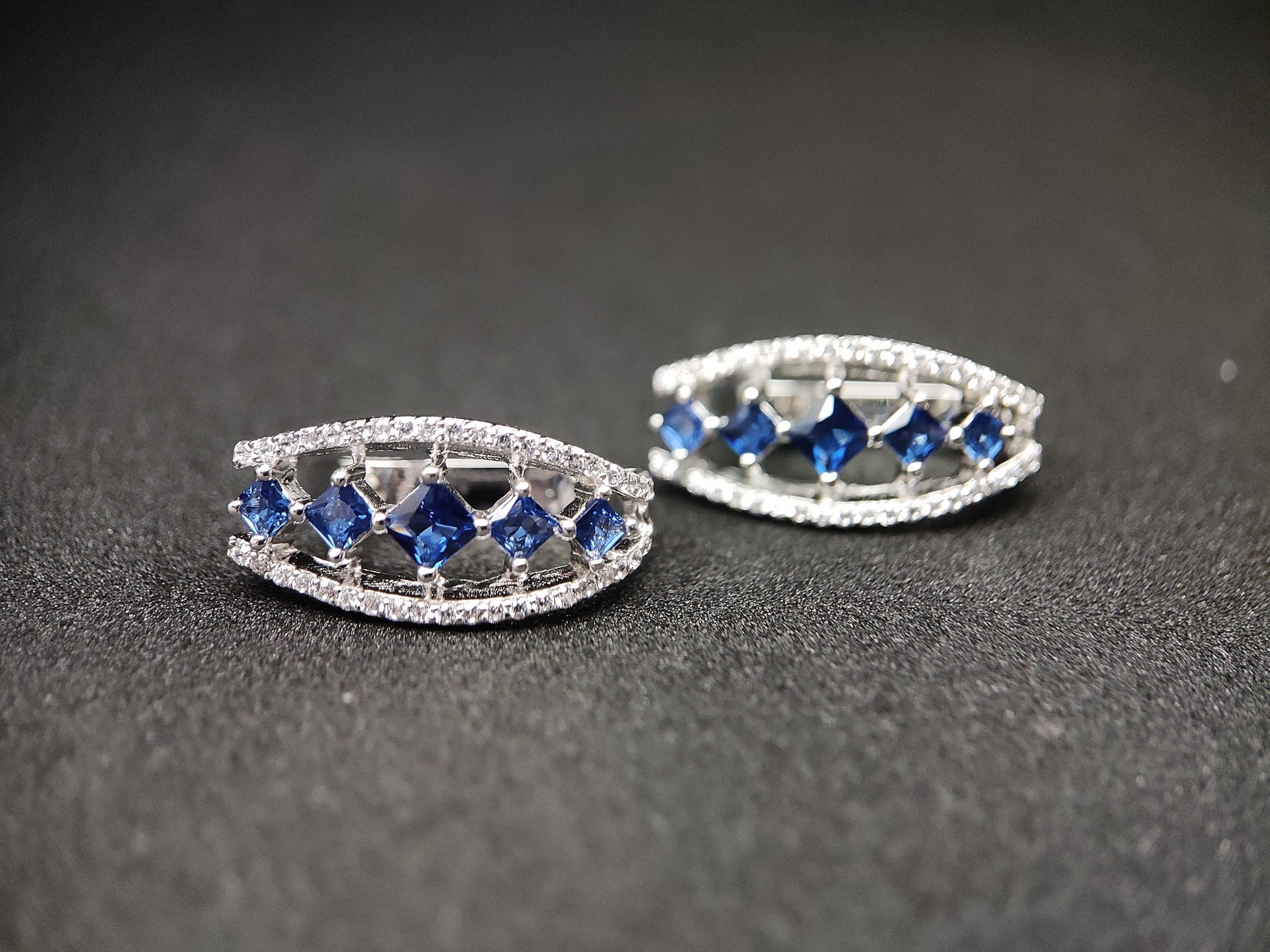 Bishakha Sterling silver earrings. made of silver, High Quaility AD Diamonds and princess cut stone Blue in color