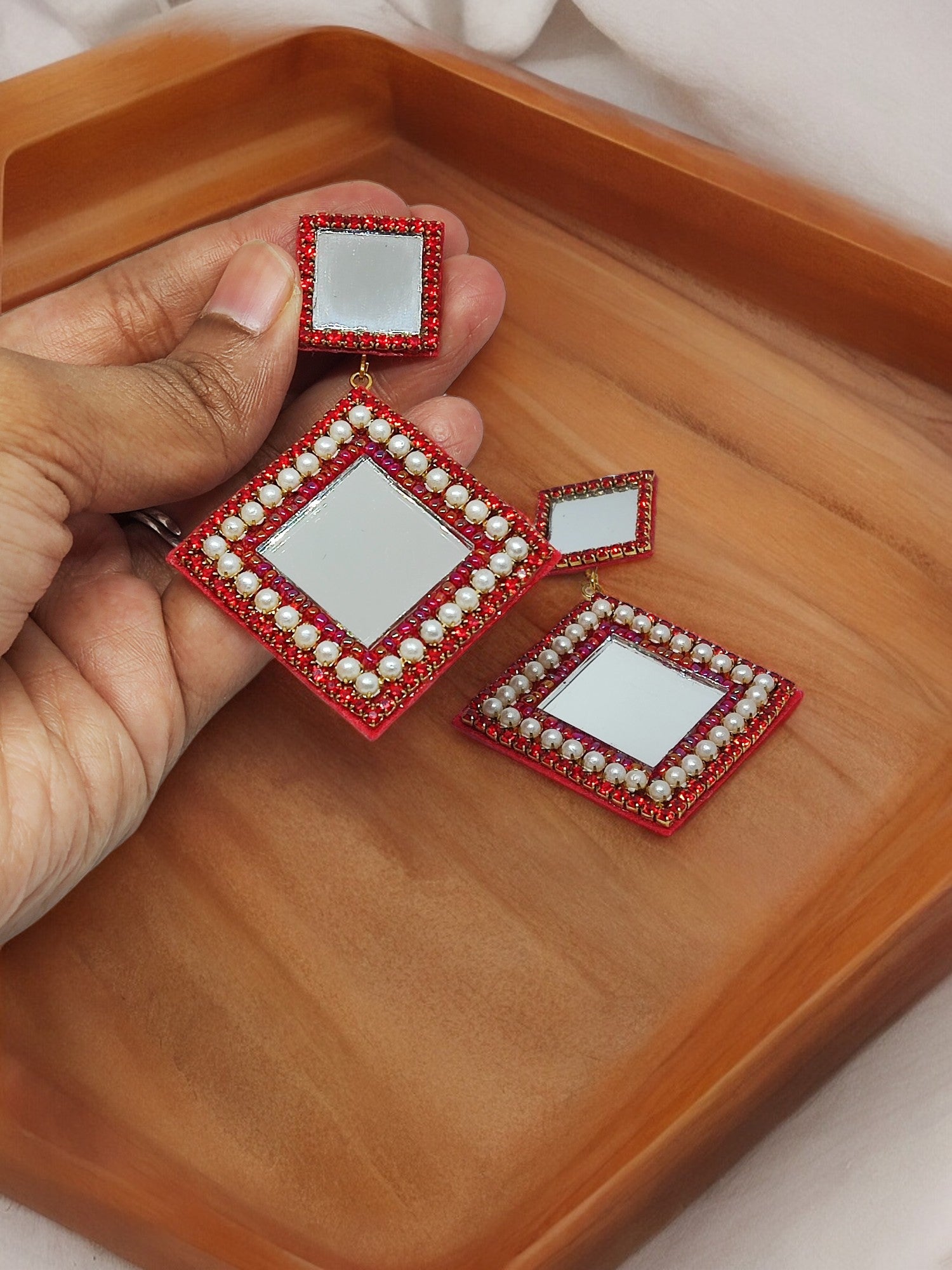 Scarlett mirror embroidery earrings from Anusangi Collections with red beaded and pearl detailing